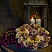 Jens Jakobson: Wedding flowers Purple Calla Lilys and roses with lantern